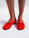 Image of model wearing Glove Mary Jane Ballet Flats in Satin in red