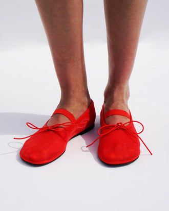 Image of model wearing Glove Mary Jane Ballet Flats in Satin in red