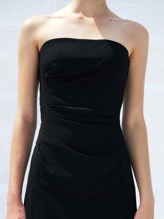 Proenza Schouler detail cropped image of model wearing Shira Strapless Dress In Matte Viscose Crepe in black