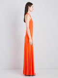 Proenza Schouler Side full length image of model wearing Naia Dress in Viscose Satin Jersey in Tangerine
