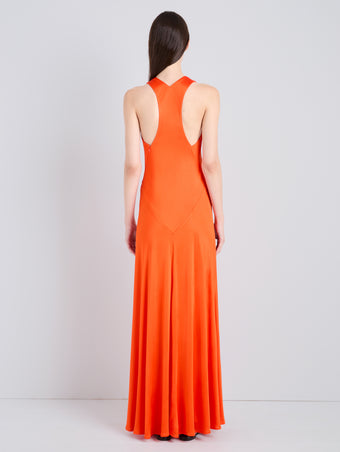 Proenza Schouler Back full length image of model wearing Naia Dress in Viscose Satin Jersey in Tangerine