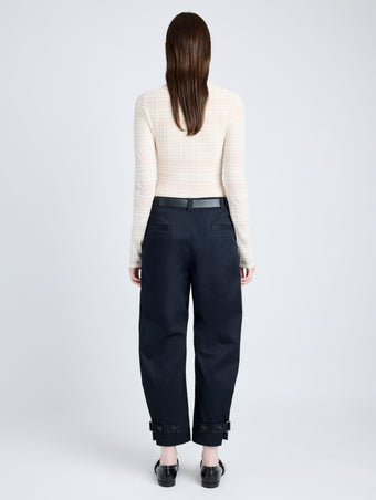 Back full length image of model wearing Cotton Twill Tapered Pants in BLACK