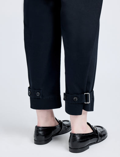 Detail image of model wearing Cotton Twill Tapered Pants in BLACK