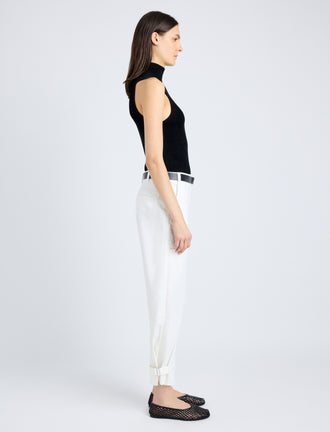 Side full length image of model wearing Cotton Twill Tapered Pants in OFF WHITE