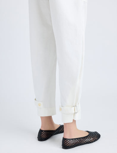 Detail image of model wearing Cotton Twill Tapered Pants in OFF WHITE