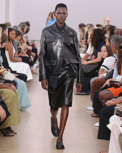 Runway image of model wearing Ida Top In Washed Habotai in black